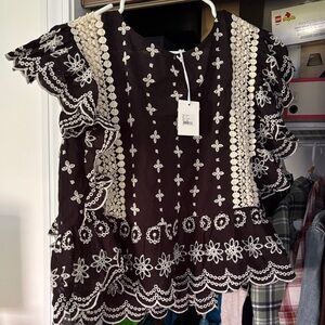 Elegant Black and Cream Embroidered Blouse